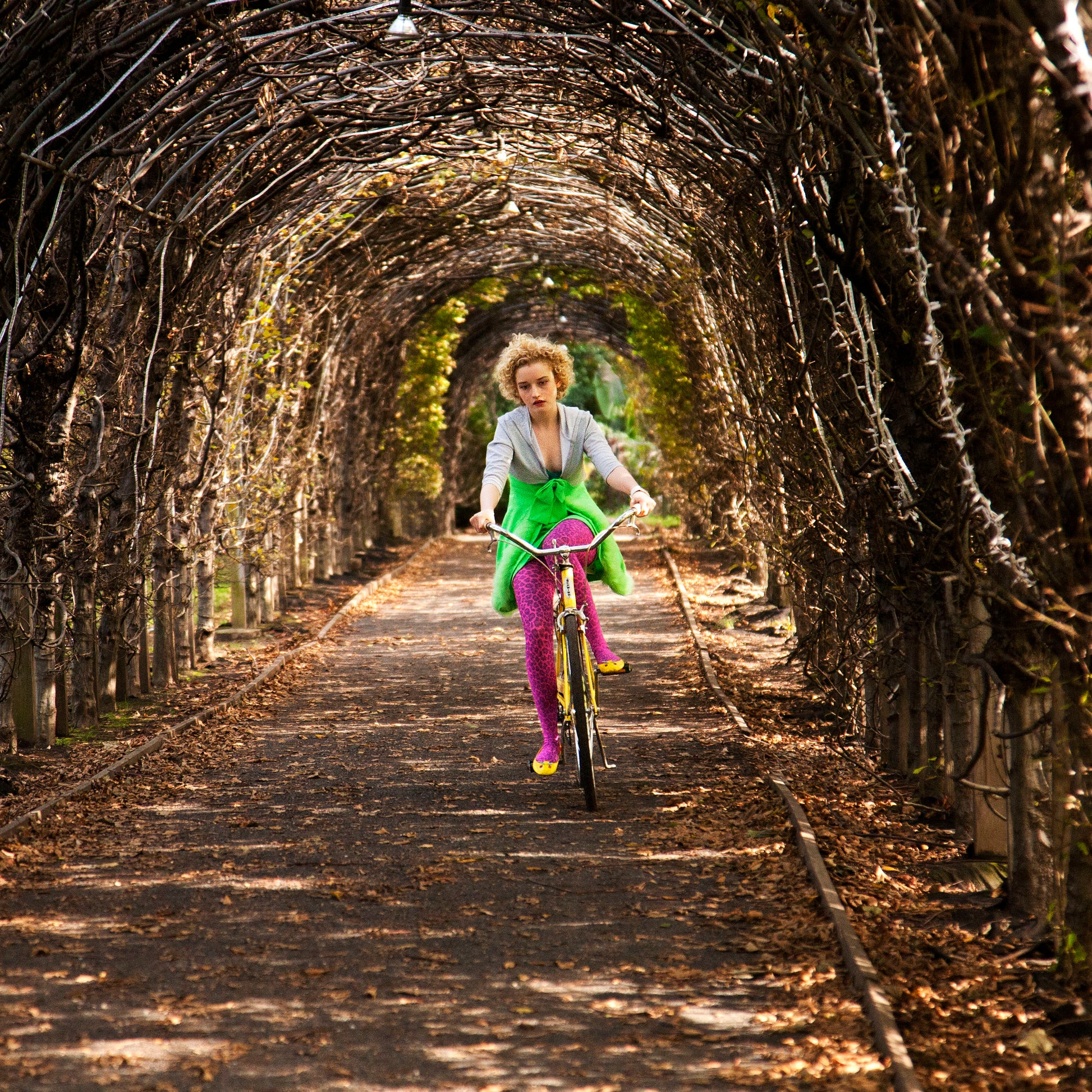 Julia Garner on a Bike